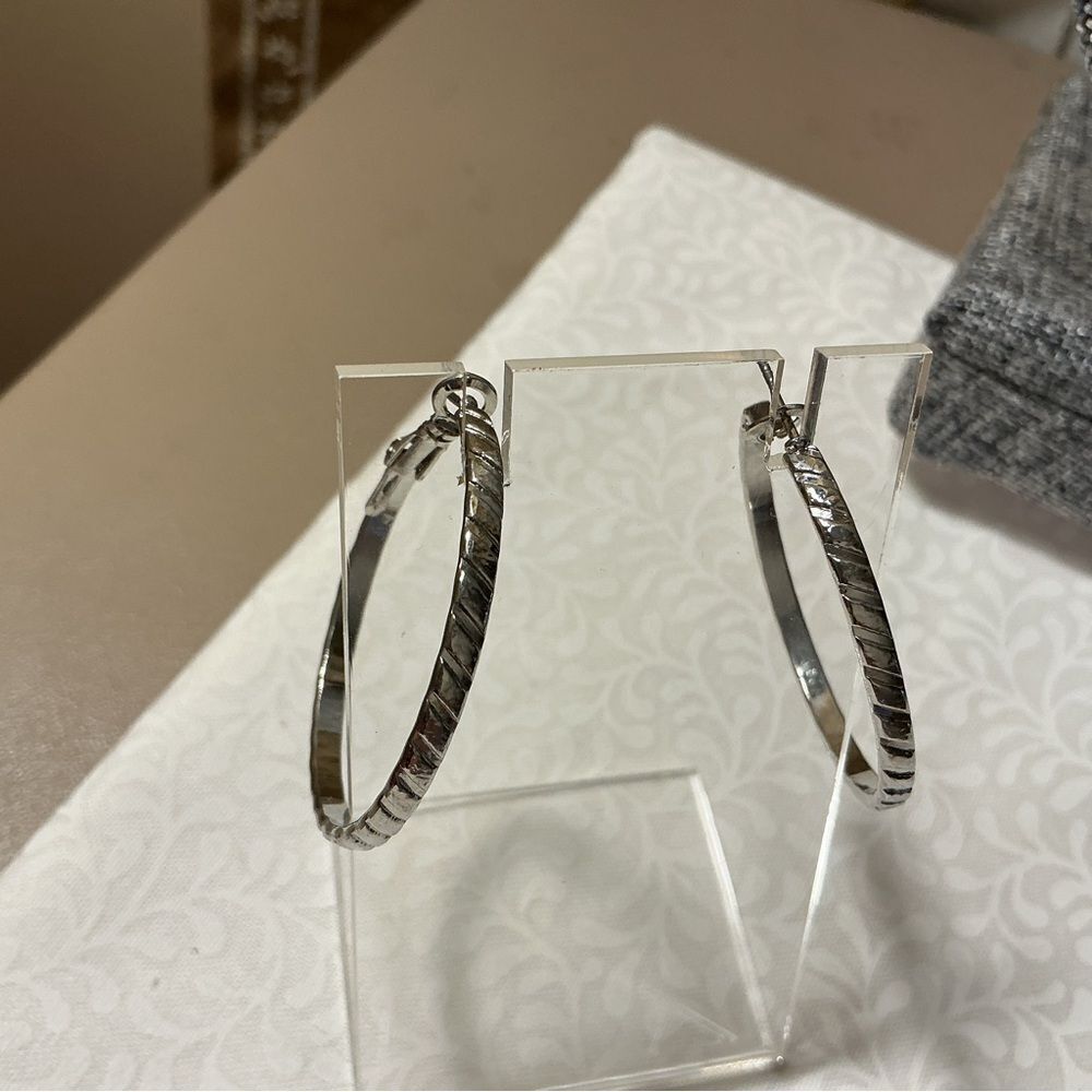 Silvertone Diamond Cutting Hoop Earrings